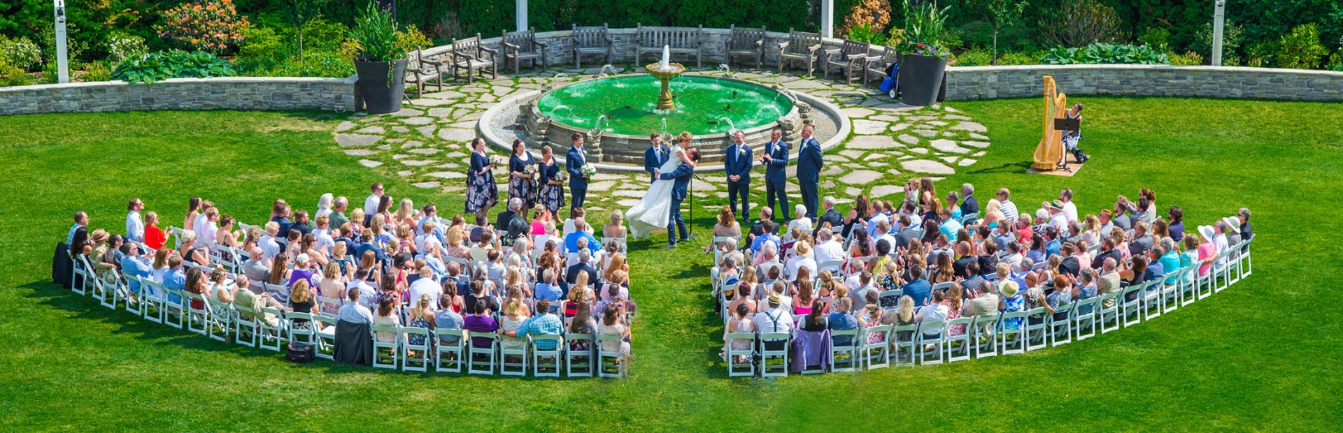 Guests sitting at a wedding on the lawn