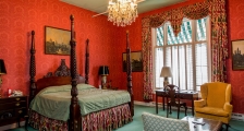 Suite with king bed and chairs