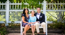 Parents with child on bench